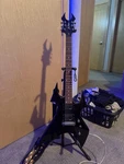 B.c. Rich Warlock Black Right-handed 6-STRING Electric Guitar With Coffin Case. Fixed Price $550.00.