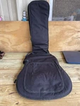 Polyester Guitar Bag - Levy Model EM8: Black Backpack Padded. Fixed Price $29.45.
