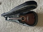 Ibanez Electric Acoustic Guitar W/ Wolfpak Case, Kyser Capo, Misc Music Books. Fixed Price $199.99.