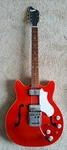 Supro Clermont Electric Guitar Red Semi Hollow Body, Tremolo Bar & Case. Fixed Price $2000.00.