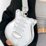 Music Lovers Trendy Guitar C/ Bag, Fun For All Ages Silver & White Faux Leathe. Fixed Price $22.69.