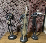 Musicians Set Of 3 Figurines Playing Saxophone Violin And String Bass. Fixed Price $200.00.