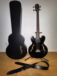Epiphone Rivoli Semi-hollow Body Bass Guitar With Case. Fixed Price $1350.00.