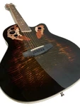 Acoustic/electric Guitar Ovat. Style 12 String Flamed Round Back With Eq. Fixed Price $225.00.